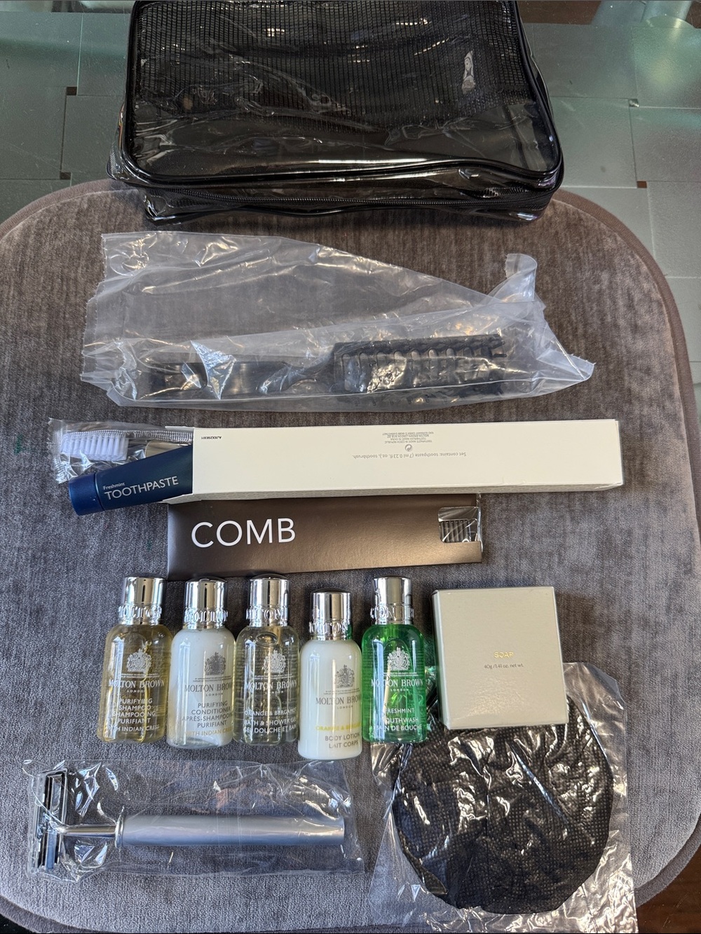 Toiletry Set -Clear Travel Pouch Black and Silver with 13 Molton Brown set.